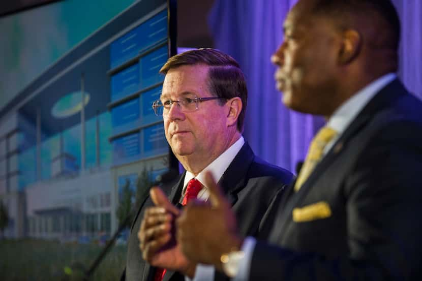 Jim Lentz (left), CEO of Toyota Motor North America, and Harry LaRosiliere, mayor of Plano,...