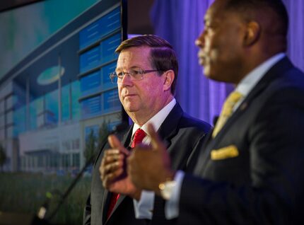 Jim Lentz (left), CEO of Toyota Motor North America, and Harry LaRosiliere, mayor of Plano,...