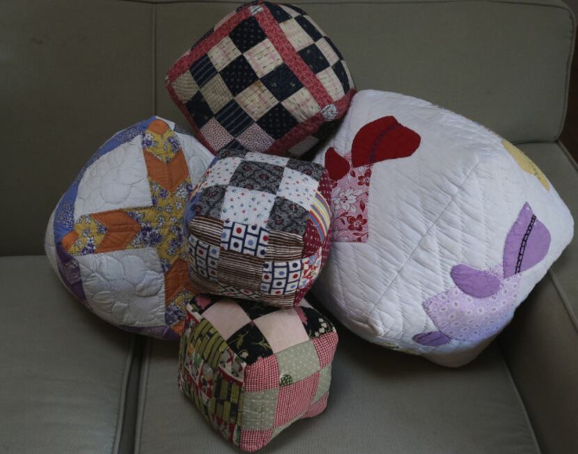 Susan Patterson recycles damaged quilts in to quilt squares and pillows.