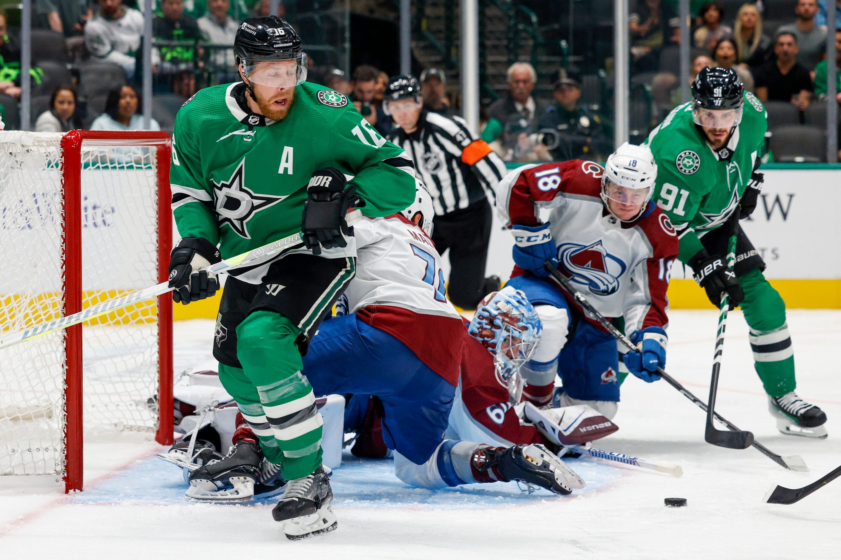 Dallas Stars center Joe Pavelski (16) circles for the puck in front of the Colorado...