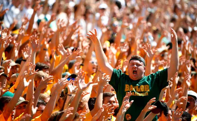Baylor fans cheer for their team against SMU during the first quarter at McLane Stadium in...