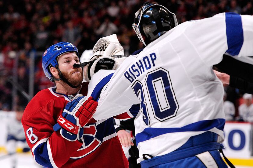 MONTREAL, QC - FEBRUARY 1:  Brandon Prust #8 of the Montreal Canadiens and Ben Bishop #30 of...