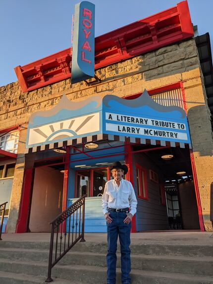 Charlie McMurtry, 72, the younger brother of author Larry McMurtry, stands under the marquee...