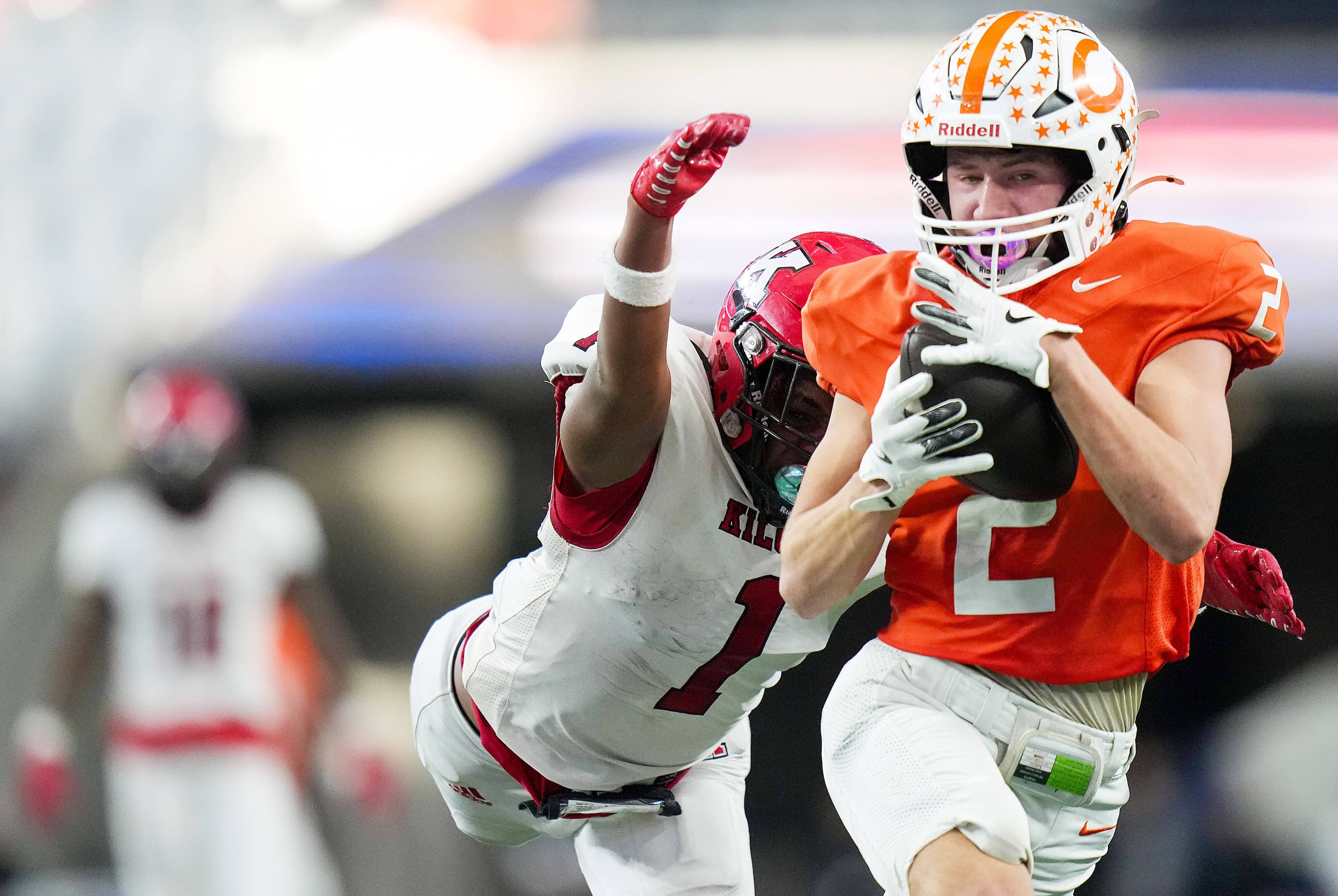 Celina's Colton Rodriguez (2) hauls in a 50-yard touchdown pass from quarterback Bowe...