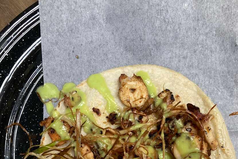 The pulpo taco from Revolver Taco Lounge Gastro Cantina in is made with Mediterranean...