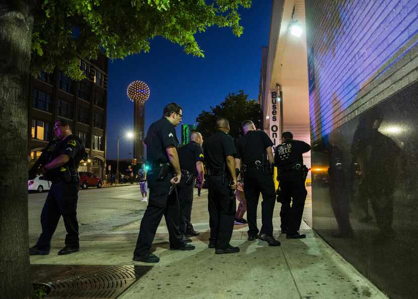 Dallas police cleared the area around the Greyhound bus station downtown on Thursday night. 
