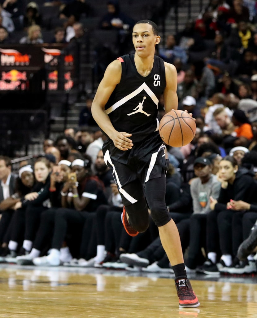 FILE - In this April 8, 2018, file photo, the Black Team's Darius Bazley (55) moves the ball...