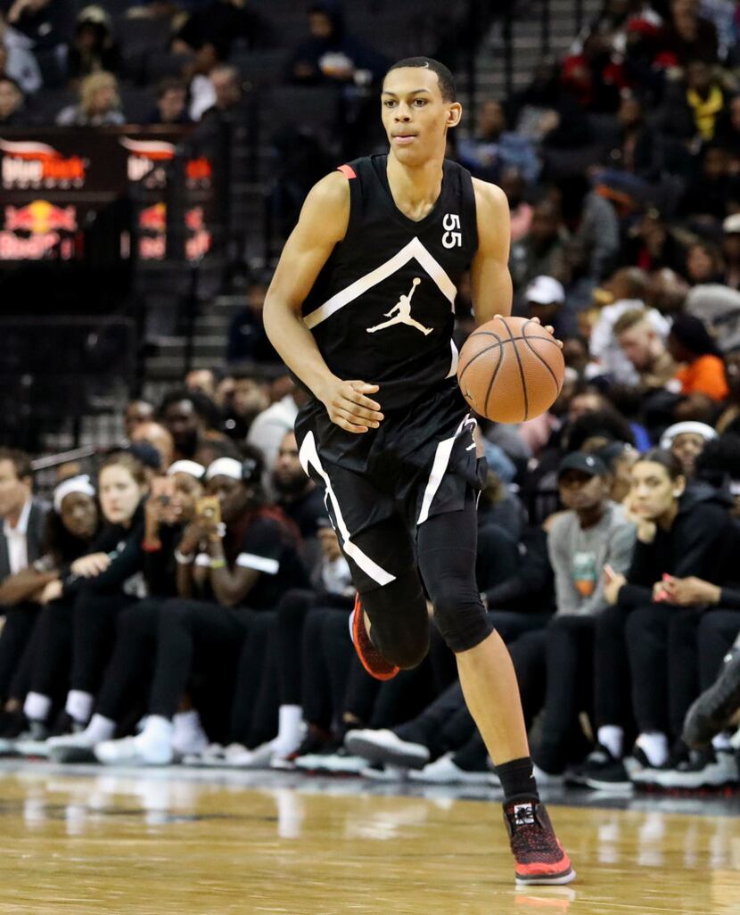 FILE - In this April 8, 2018, file photo, the Black Team's Darius Bazley (55) moves the ball...