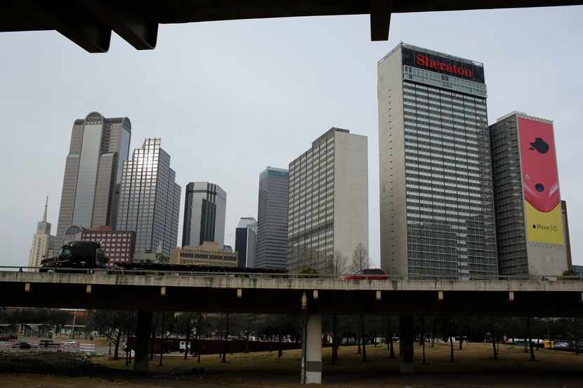 The elevated Interstate 345 separates downtown Dallas and Deep Ellum. The highway could be...