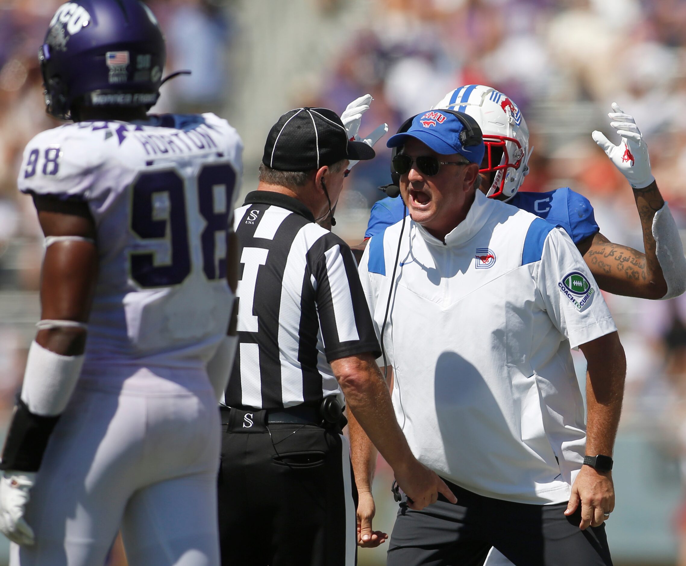 SMU head coach Sonny Dykes argues the call of a game official during the 4th quarter of...