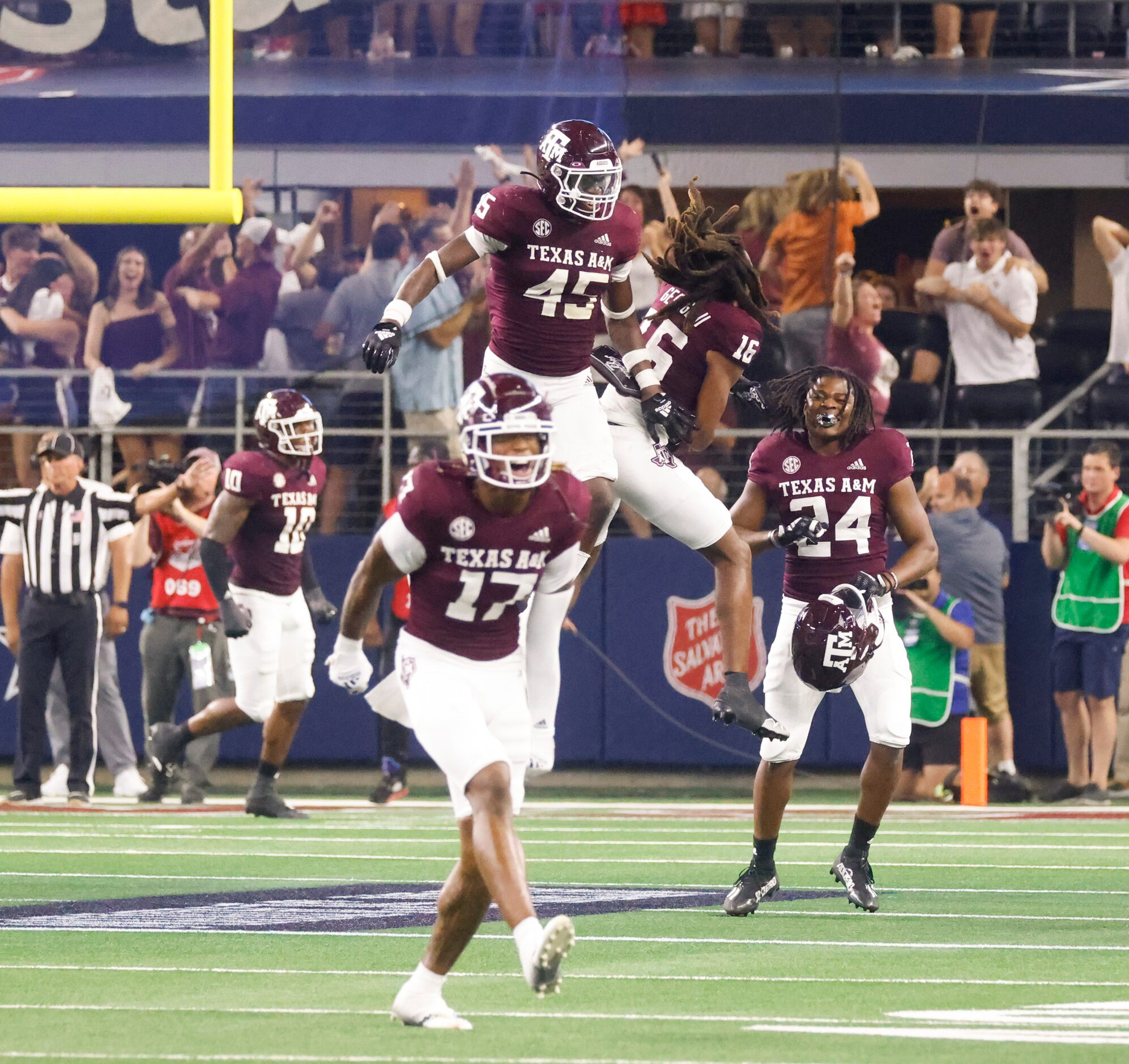 Texas A&M players celebrate as Arkansas misses to score during the second half of a football...