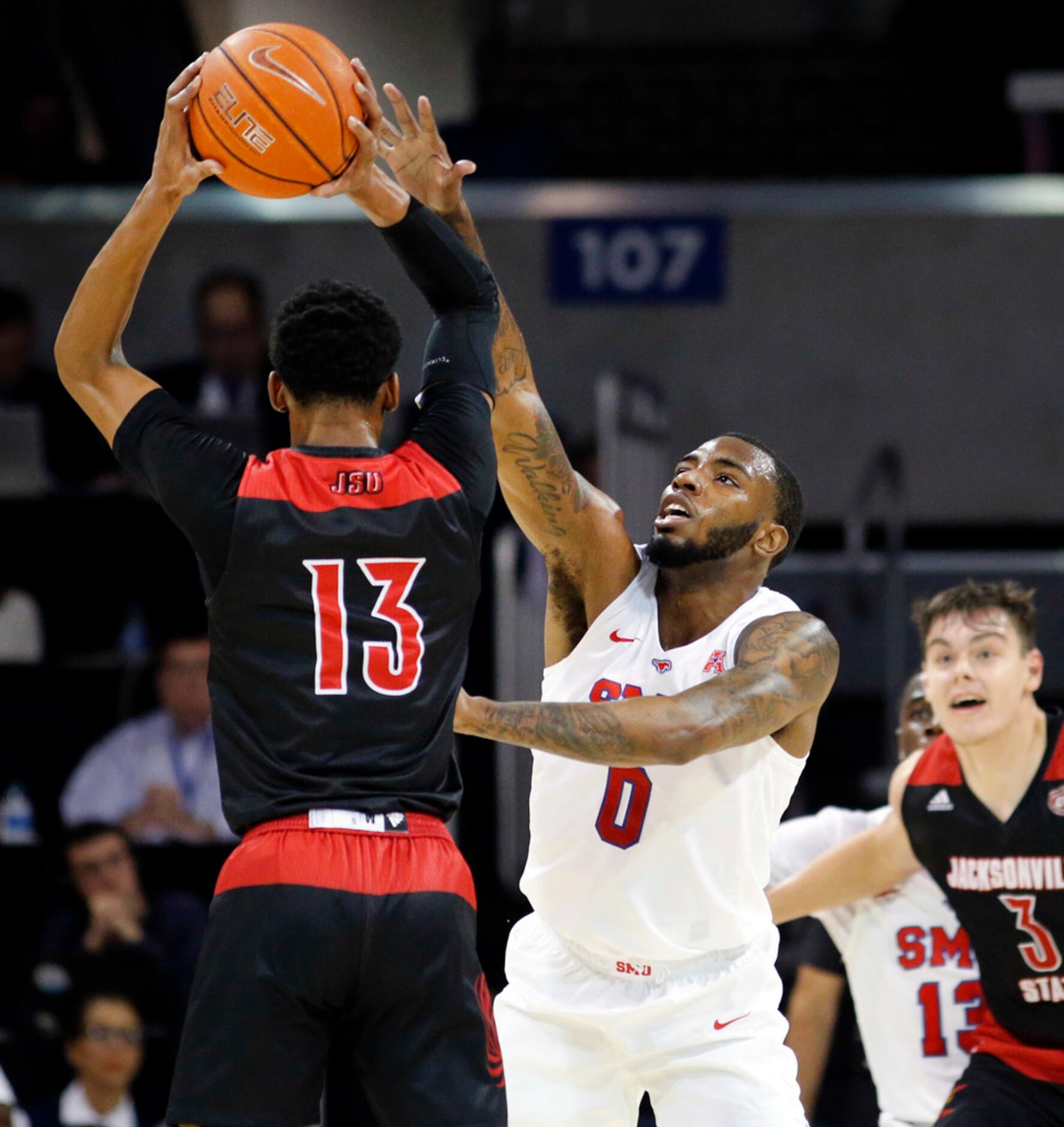 Southern Methodist Mustangs guard Tyson Jolly (0) looks to stop a pass by Jacksonville State...