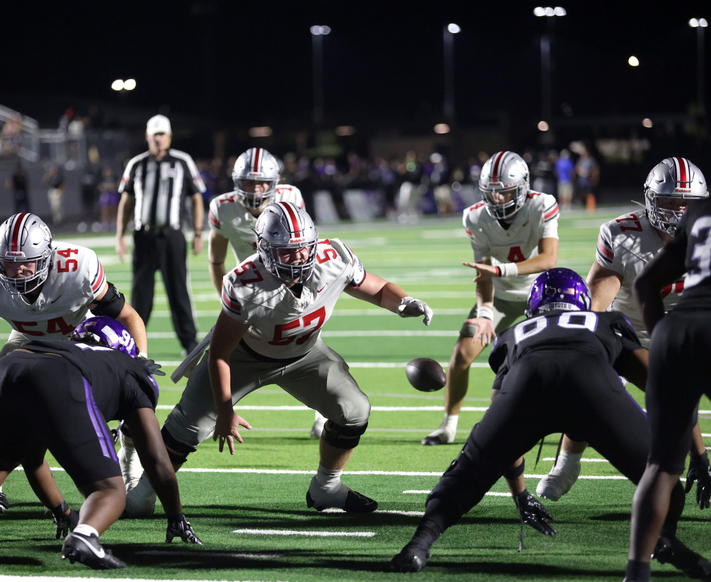 Lovejoy player #4 Jacob Janecek receives the snap during the Lovejoy High School at Anna...