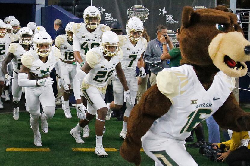 The Baylor Bears take the field before the opening kickoff during the Baylor University...