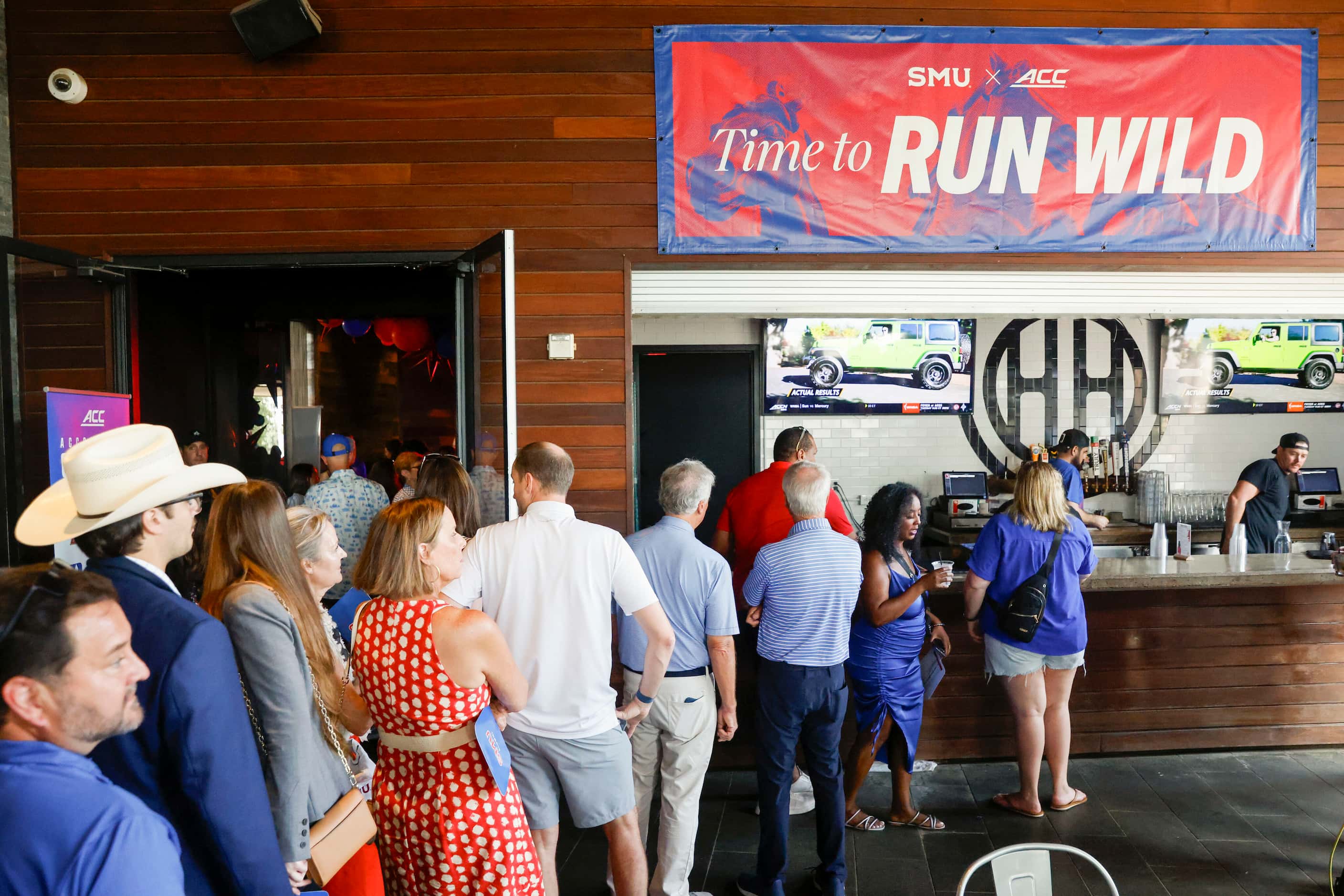 SMU alumni and supporters gather during a celebration of SMU’s first day in the ACC at...