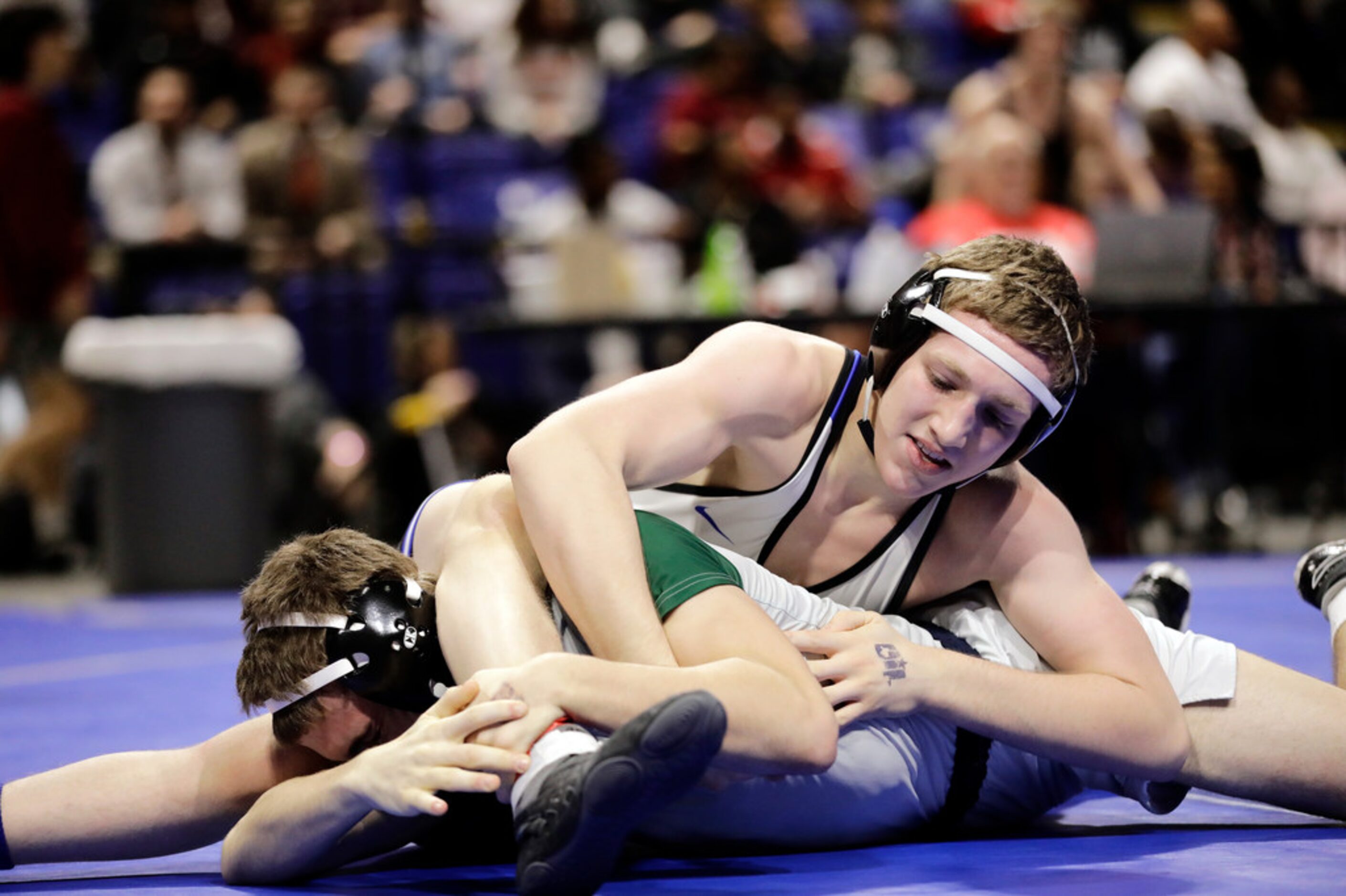 Jackson Carter of Midlothian wrestles during the UIL Texas State Wrestling Championships,...