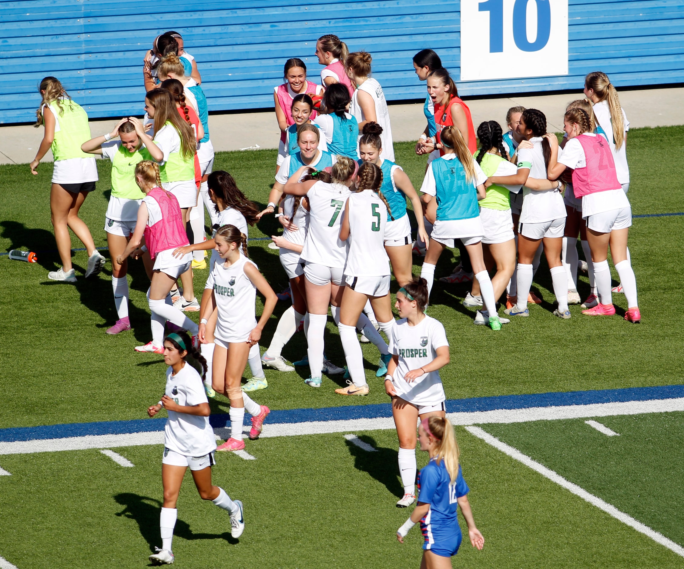 Prosper players celebrate midfielder Olivia Hess' goal during second half action against...