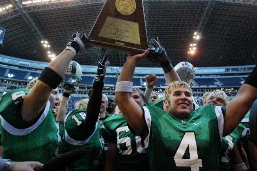 Southlake Carroll High QB Chase Daniel (4 - right) and teammates celebrate with the State...