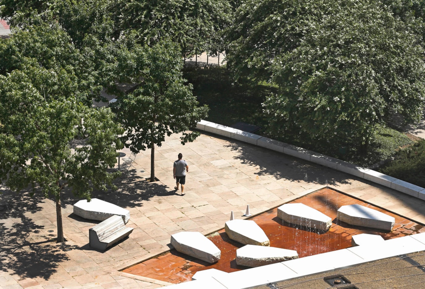 The stones in the Main Street Garden fountain area, seen from above, resemble coffins, says...