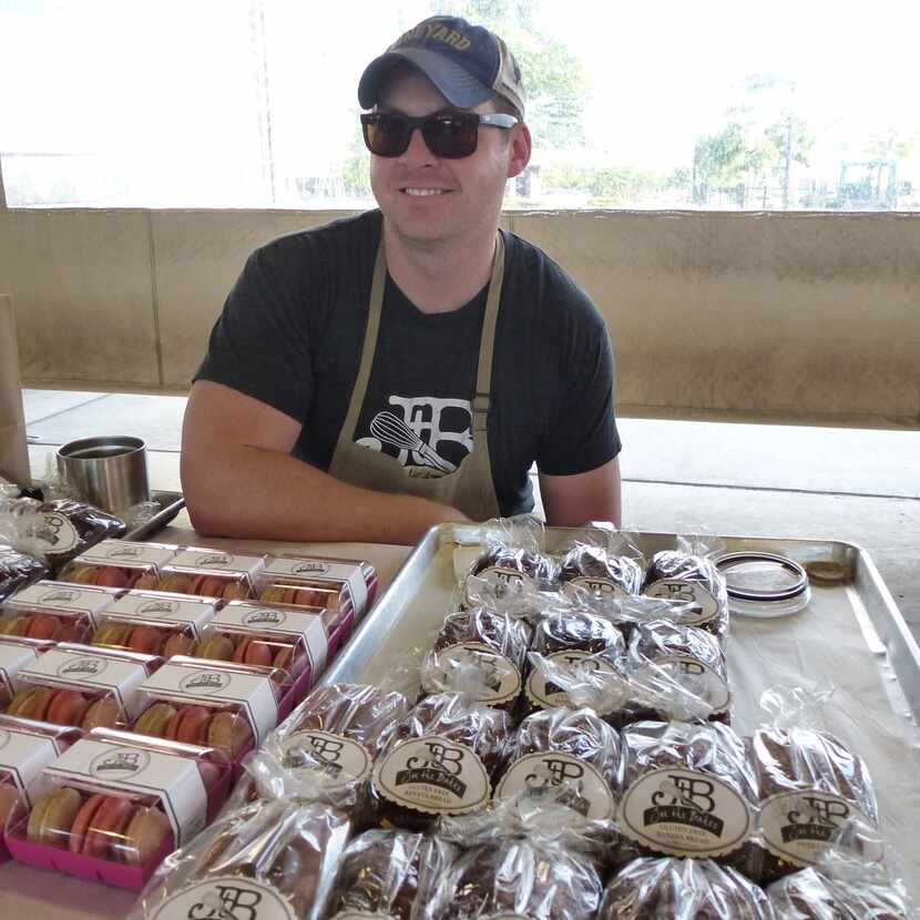 Joe the Baker, who specializes in macarons and sweet quick breads at Coppell Farmers Market,...