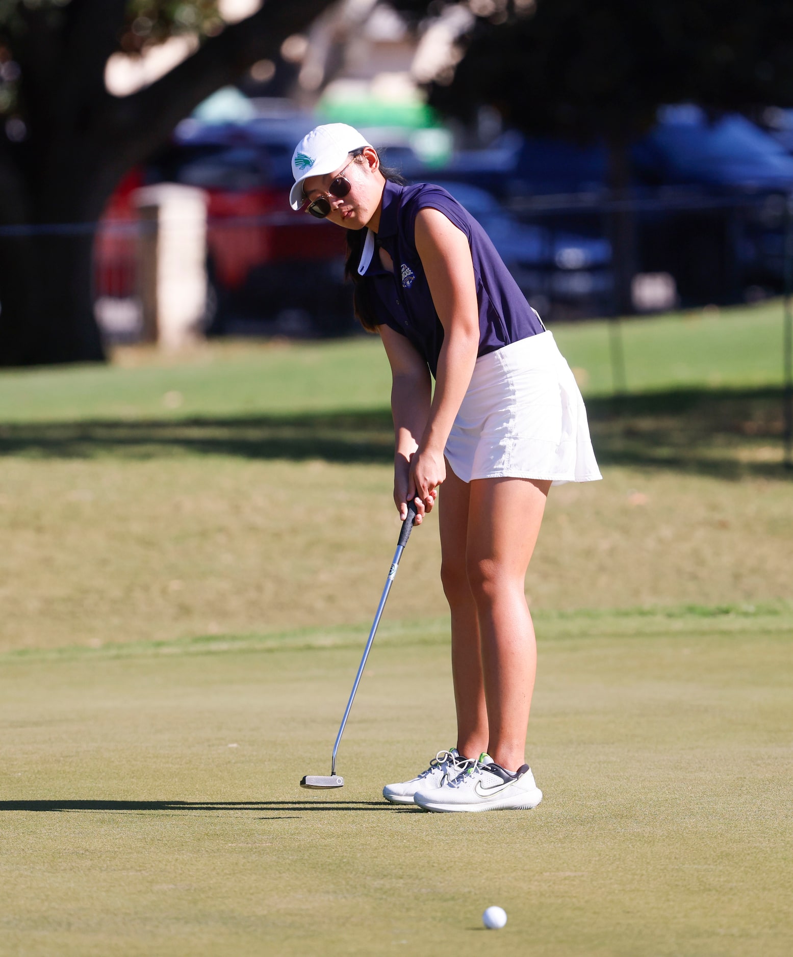 Malisone Chanthapanya of University of North Texas putts on the eighth green during the...