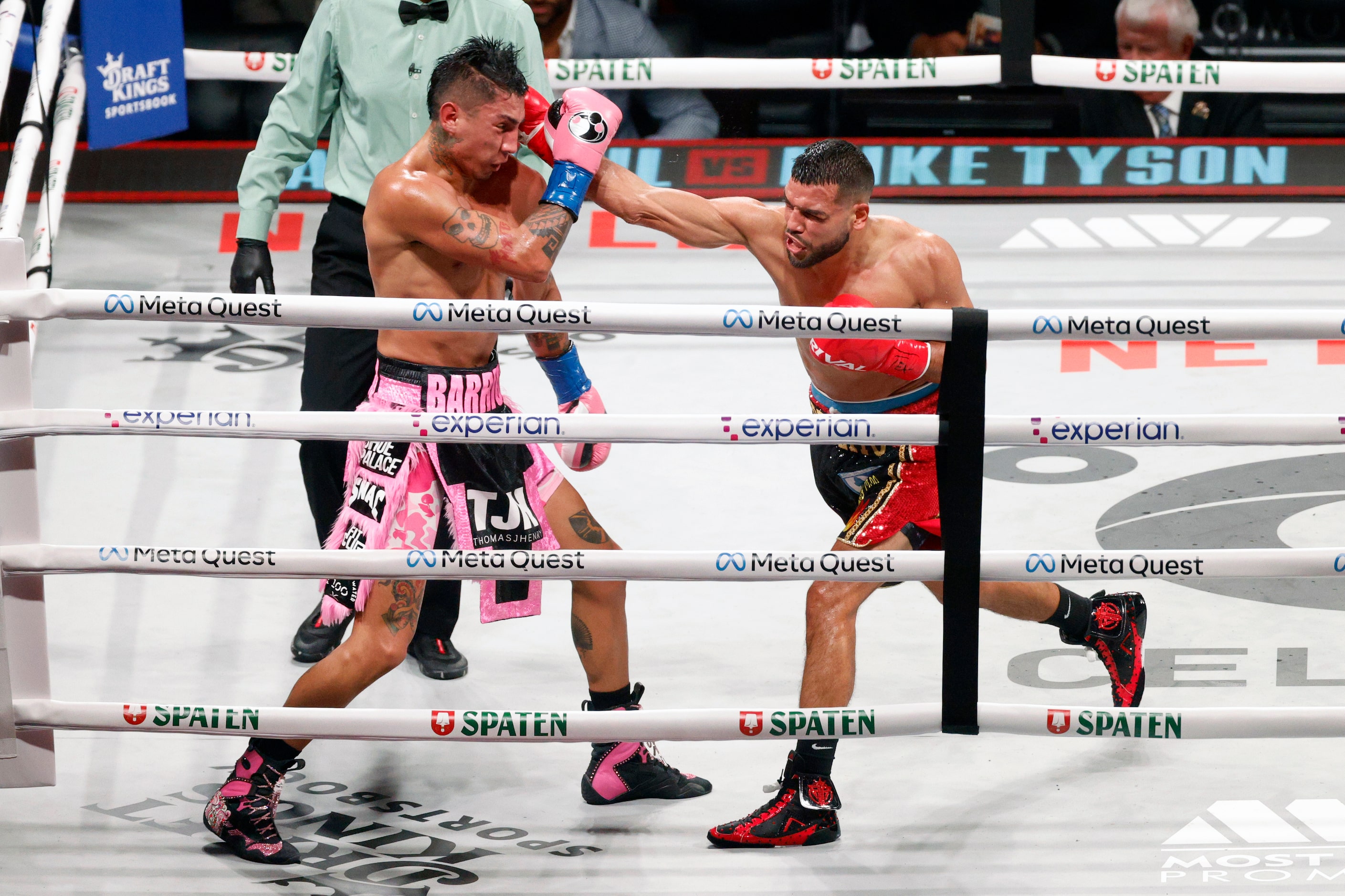 Mario Barrios (left) takes a punch from Abel Ramos during round six of a boxing match for...