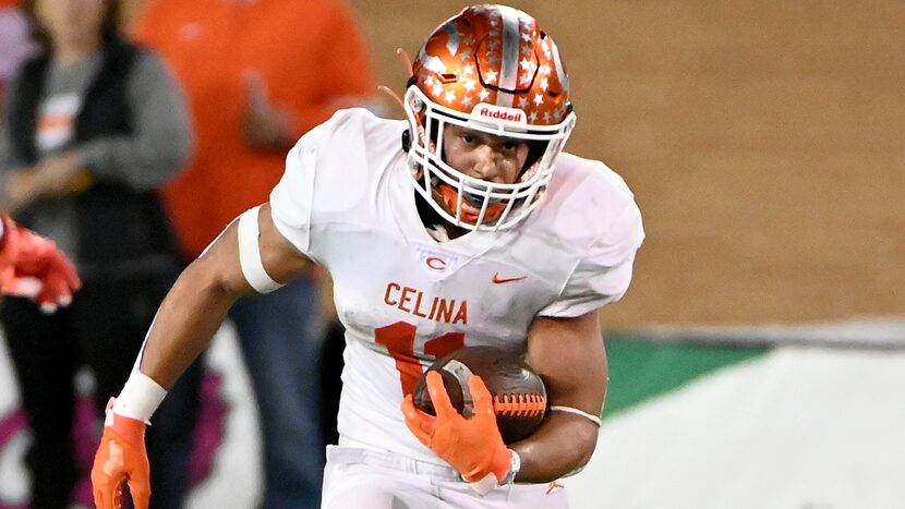 Celina's Gabe Gayton (11) runs upfield in the second half of a Class 4A Division II Region I...