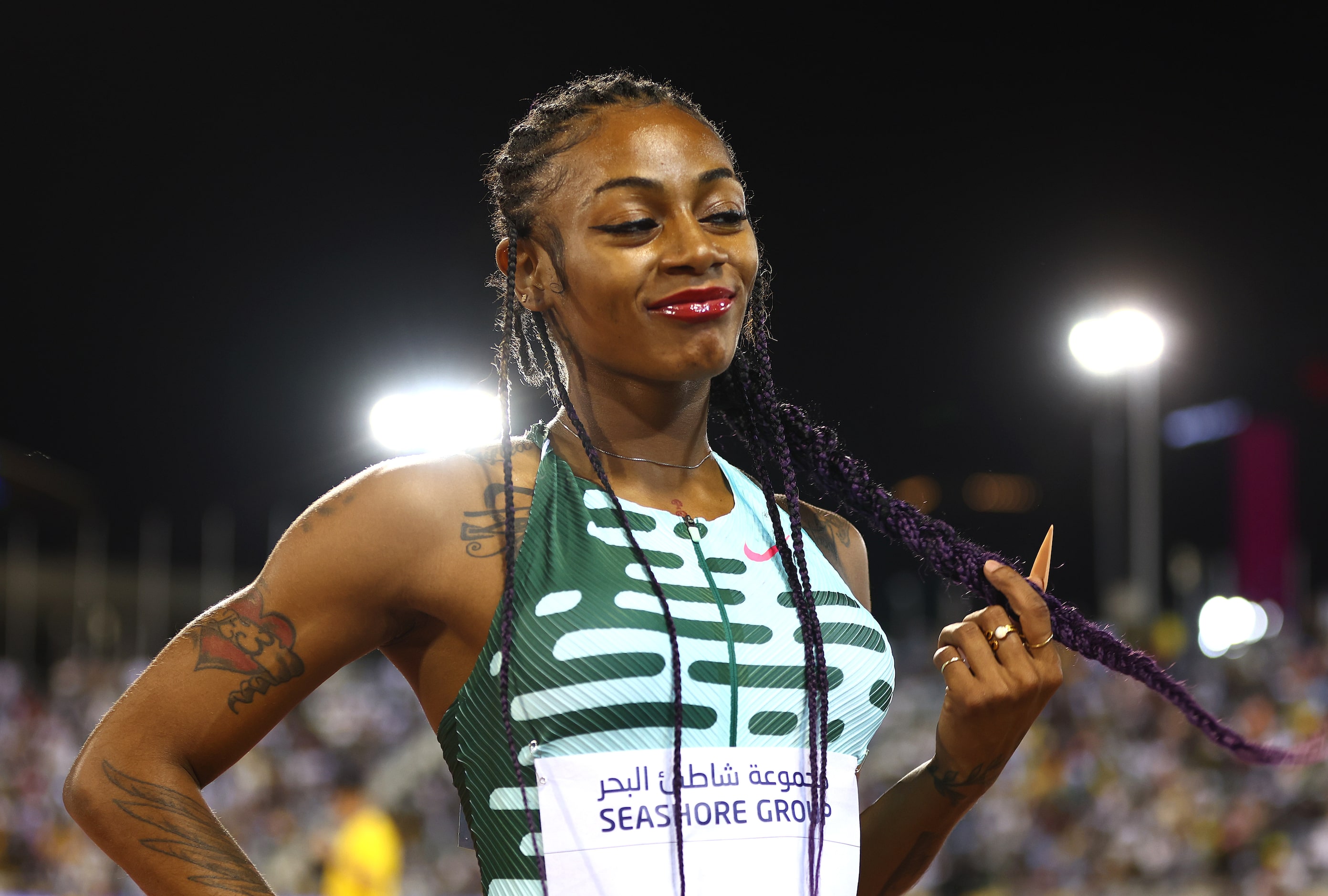 Dallas' Sha'Carri Richardson celebrates after winning the Women's 100m final  during the...