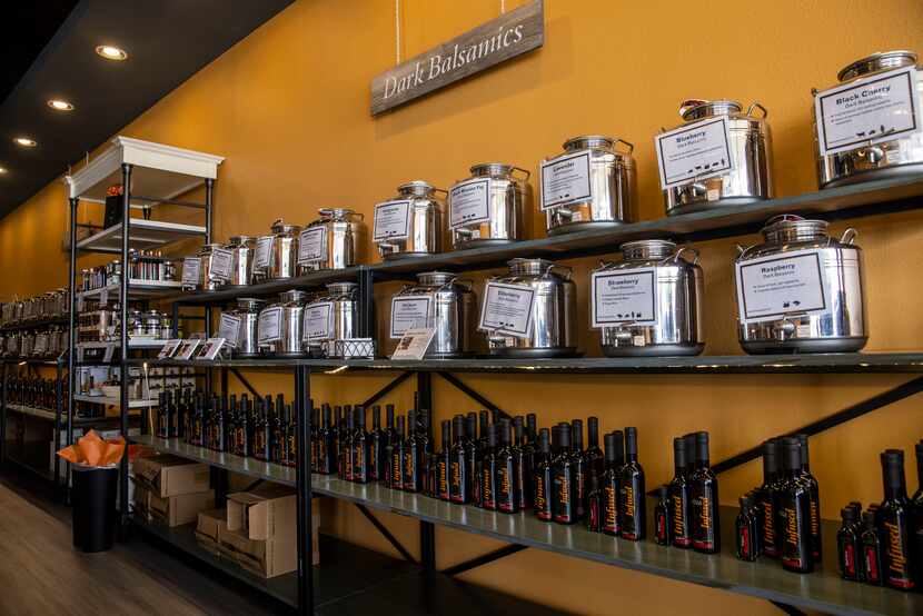 The sampling section of infused dark basalmic vinegars at Infused Oils and Vinegars.