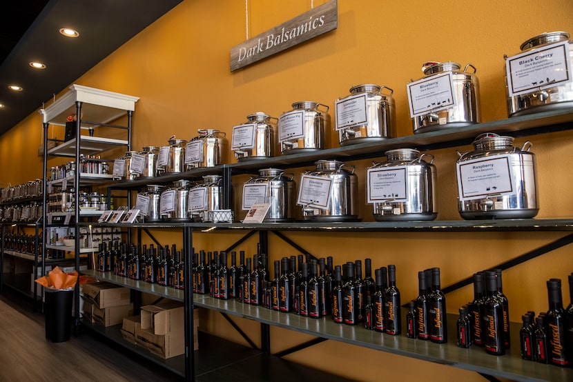 The sampling section of infused dark basalmic vinegars at Infused Oils and Vinegars.