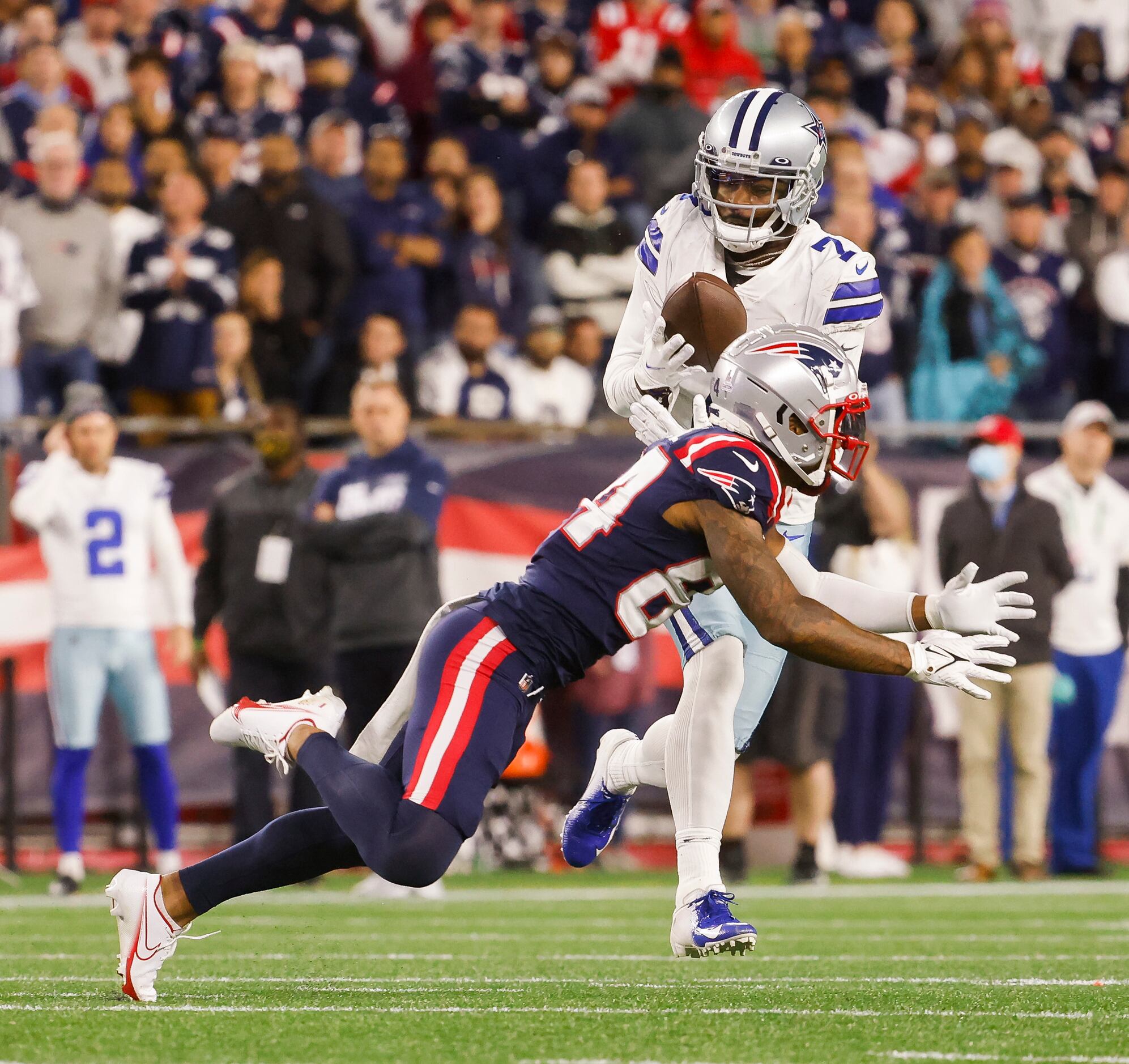 Dallas Cowboys cornerback Trevon Diggs (7) intercepts a pass intended for New England...