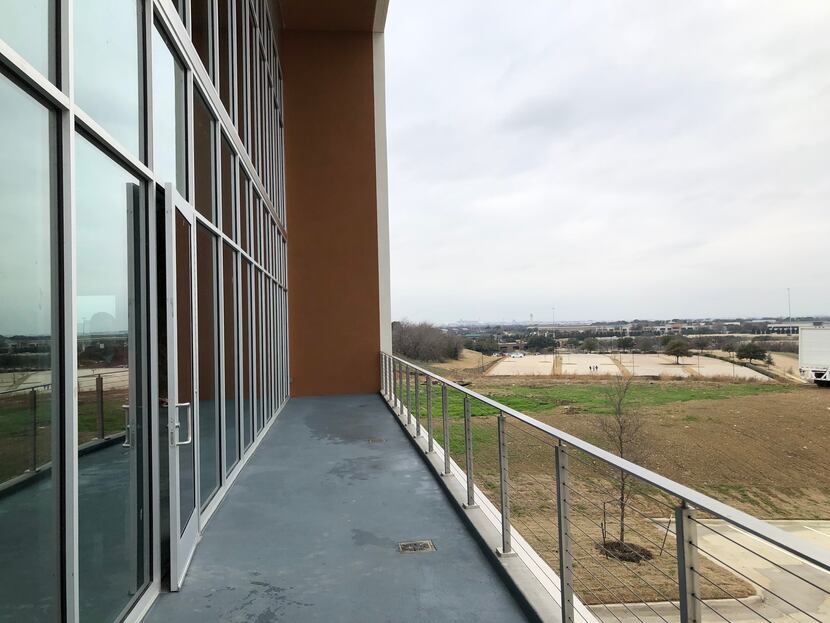The building balcony has views all the way to DFW Airport.