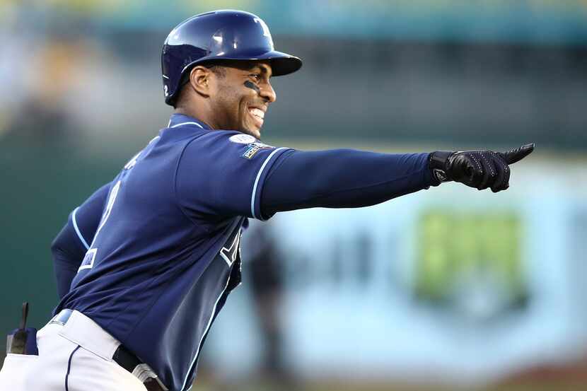 OAKLAND, CALIFORNIA - OCTOBER 02: Yandy Diaz #2 of the Tampa Bay Rays celebrates his solo...