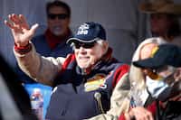 Eddie Robinson, once the oldest living former MLB player, waves to friends in Fort Worth who...