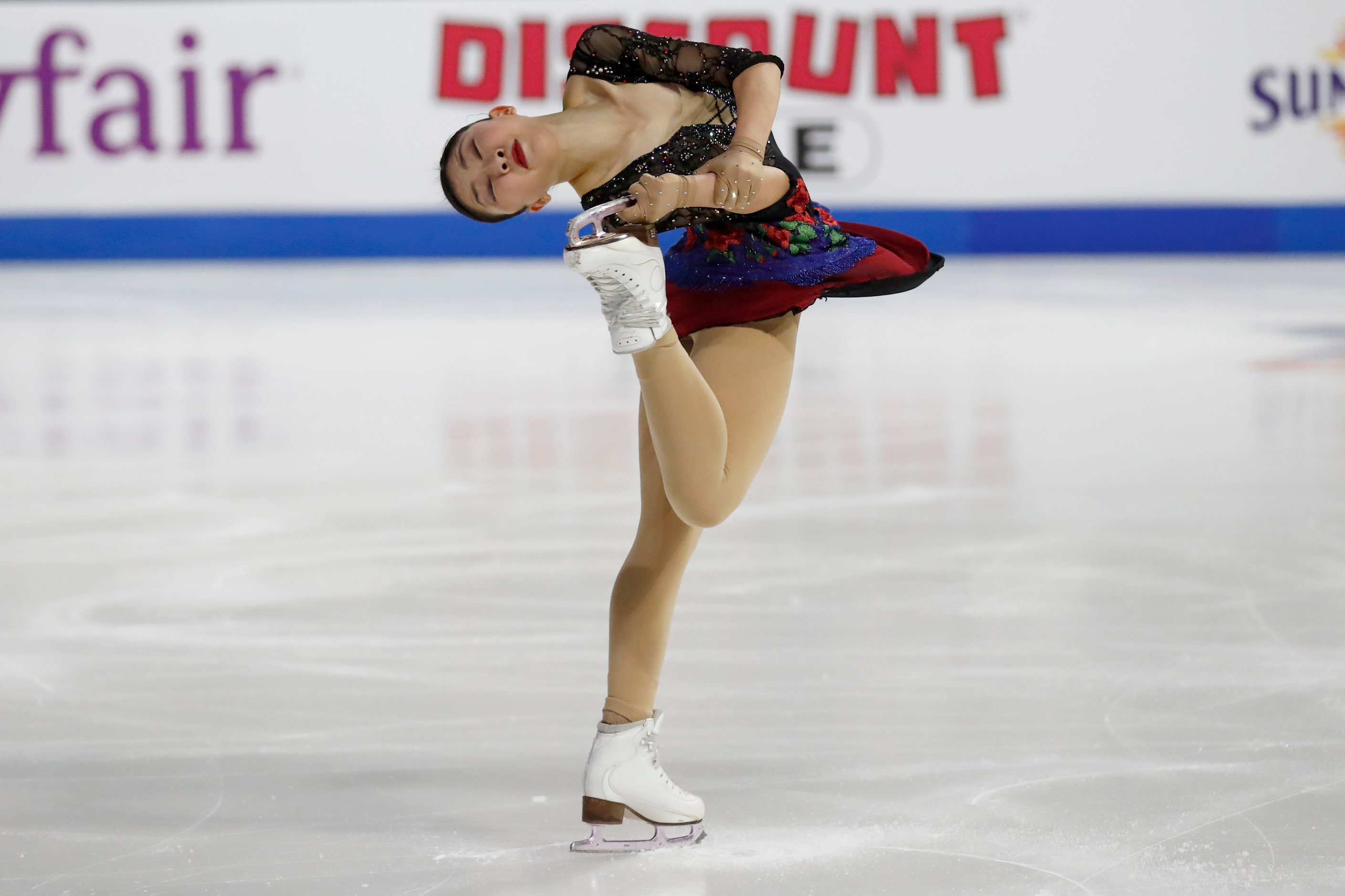 Mone Chiba, of Japan, competes in the women's short program during the Skate America figure...