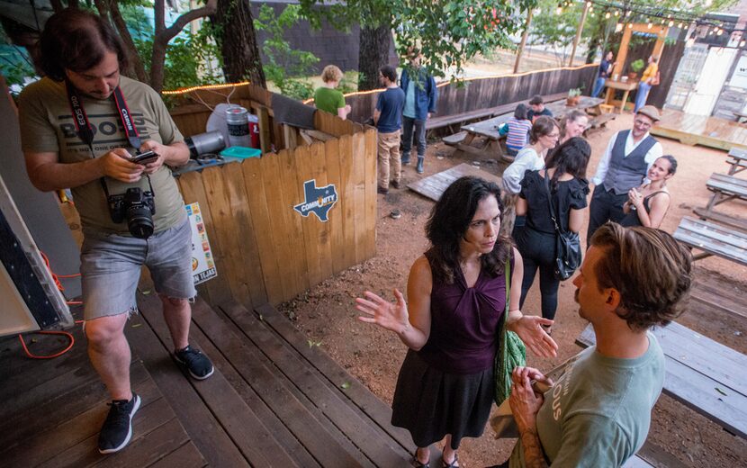 Authors and readers gather in the backyard of The Wild Detectives during the Hay Festival.