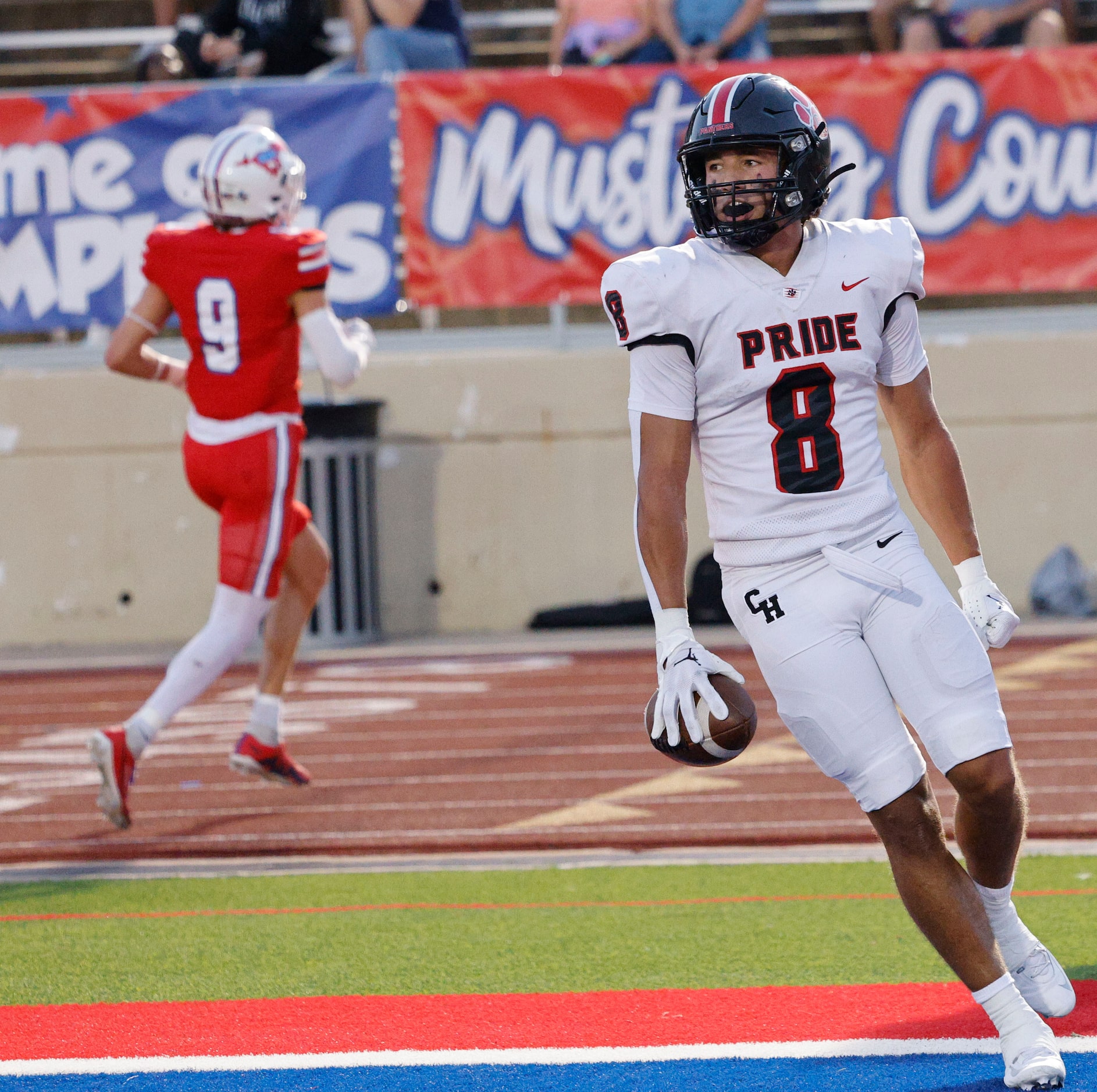 Colleyville Heritage's Braden Blueitt (8) reacts after he scored a touchdown  during the...