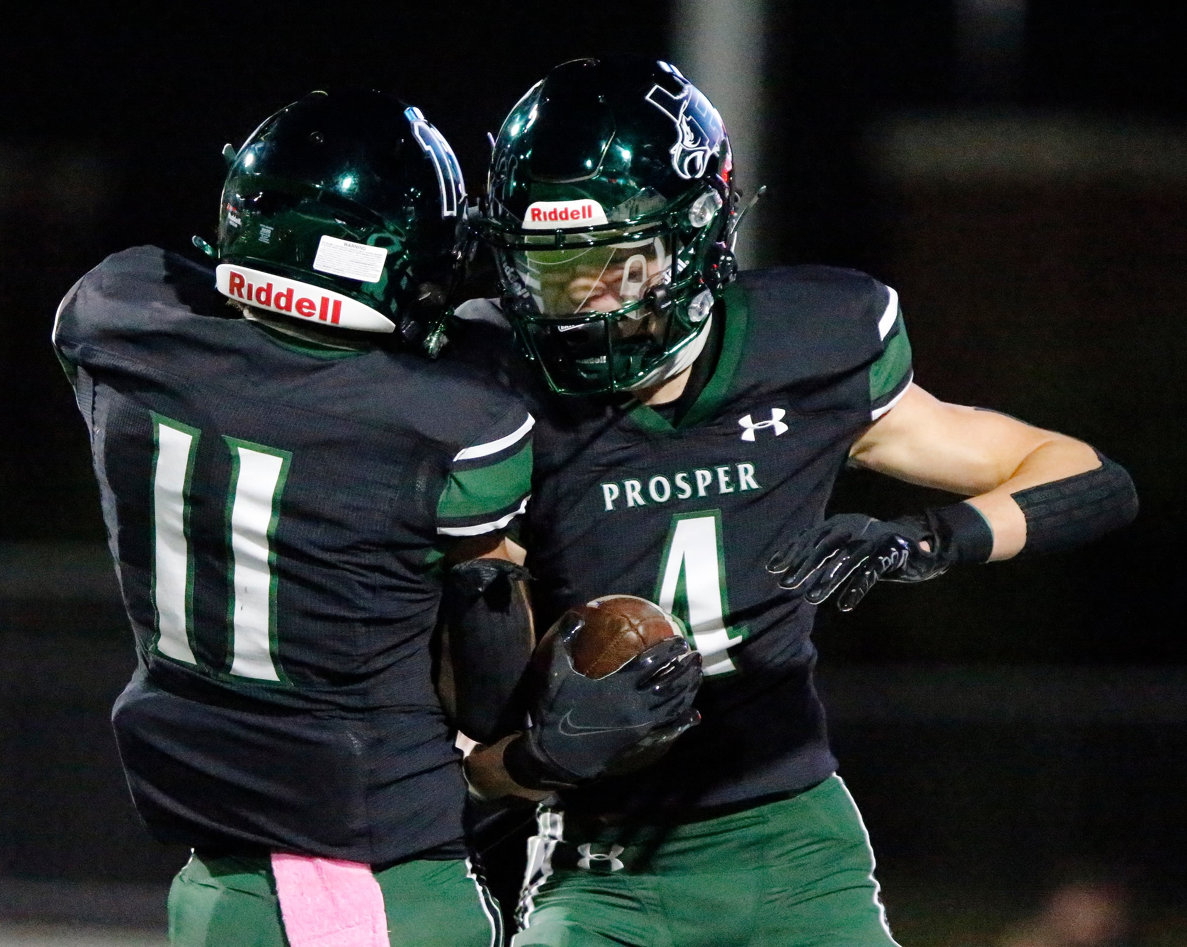 Prosper High School wide receiver Houston Hawkins (4) celebrates with Prosper High School...