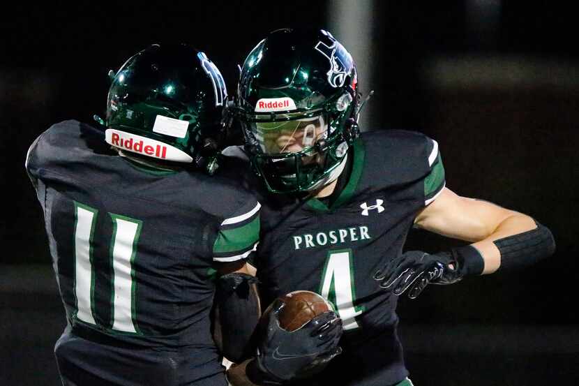 Prosper High School wide receiver Houston Hawkins (4) celebrates with Prosper High School...