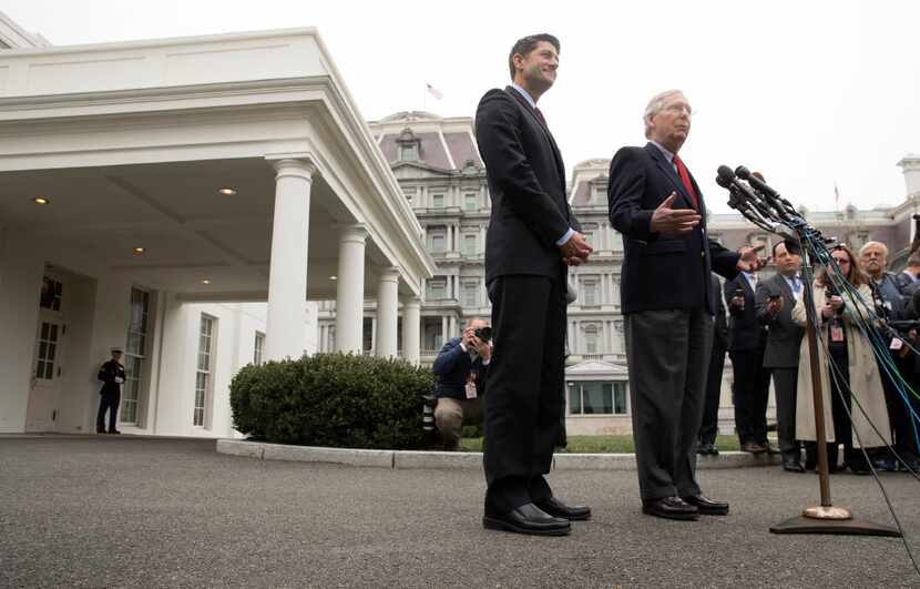 House Speaker Paul Ryan (R-Wis.) and Senate Majority Leader Mitch McConnell (R-Ky.) field...