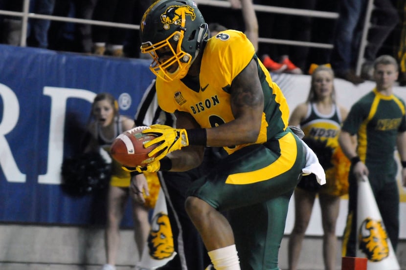 North Dakota State running back Bruce Anderson hauls in a touchdown reception during an NCAA...
