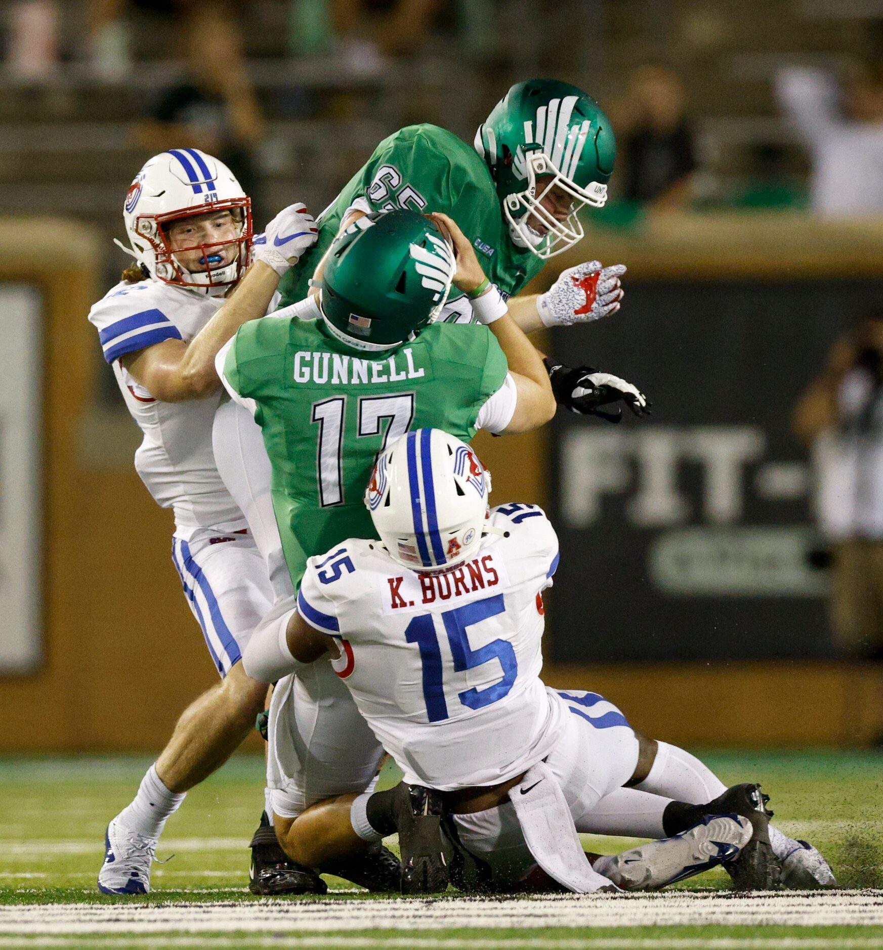 SMU linebacker Keke Burns (15) sacks UNT quarterback Grant Gunnell (17) during the fourth...