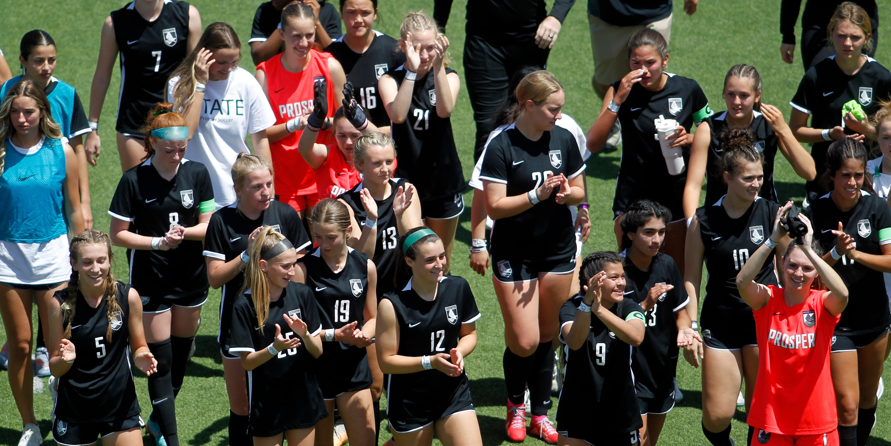  Prosper players acknowledge the support of fans following their 3-0 win over Katy Seven...