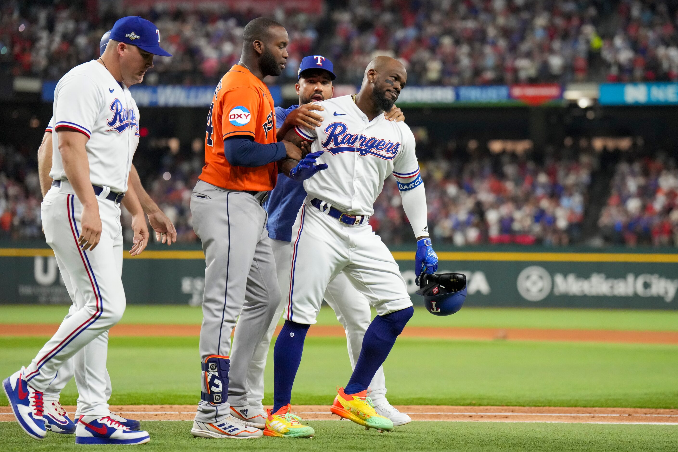 Houston Astros designated hitter Yordan Alvarez (44) and Texas Rangers infielder Ezequiel...