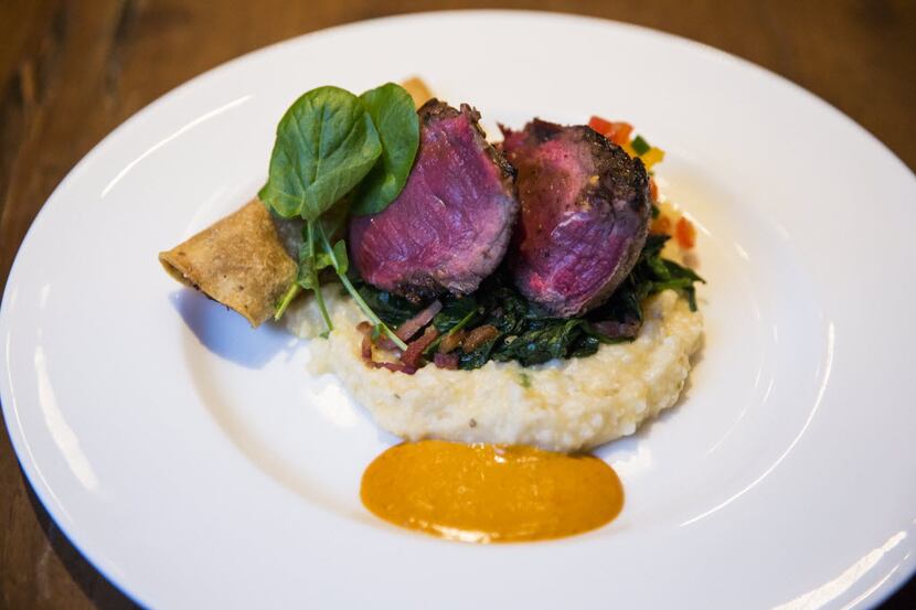Maple-black peppercorn soaked buffalo tenderloin on Brazos Valley jalapeno grits at Fearing's 