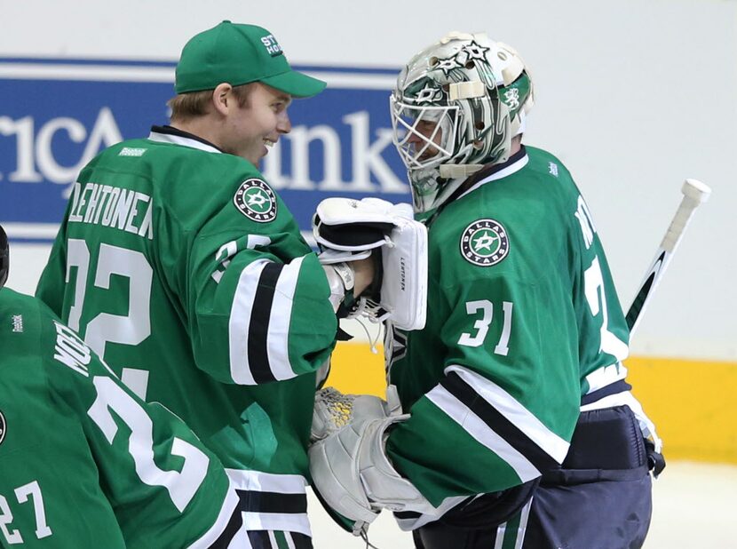 Dallas Stars goalie Kari Lehtonen (32) congratulates Dallas Stars goalie Antti Niemi (31)...