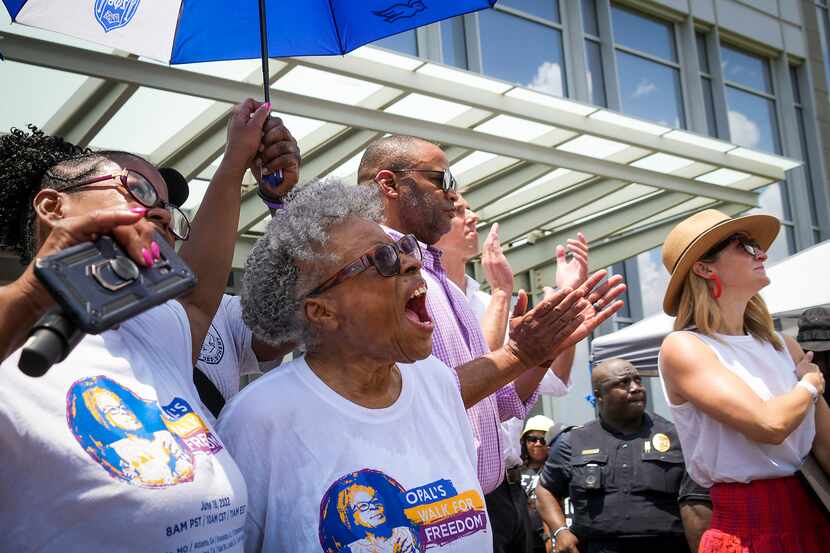 Opal Lee (center) cheers as the Juneteenth flag is raised at Fort Worth City Hall at the...
