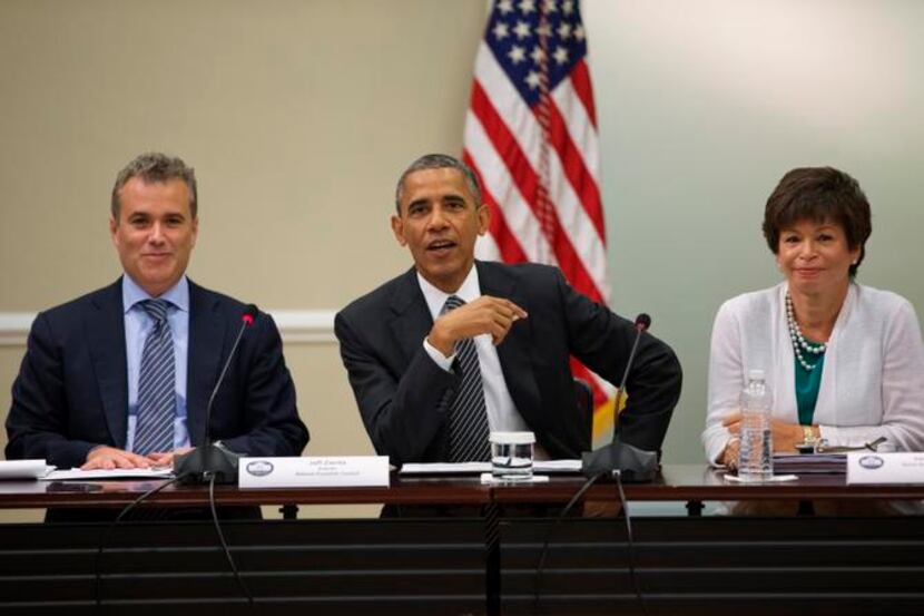 
President Barack Obama, with advisers Jeff Zients and Valerie Jarrett, wants the payment...