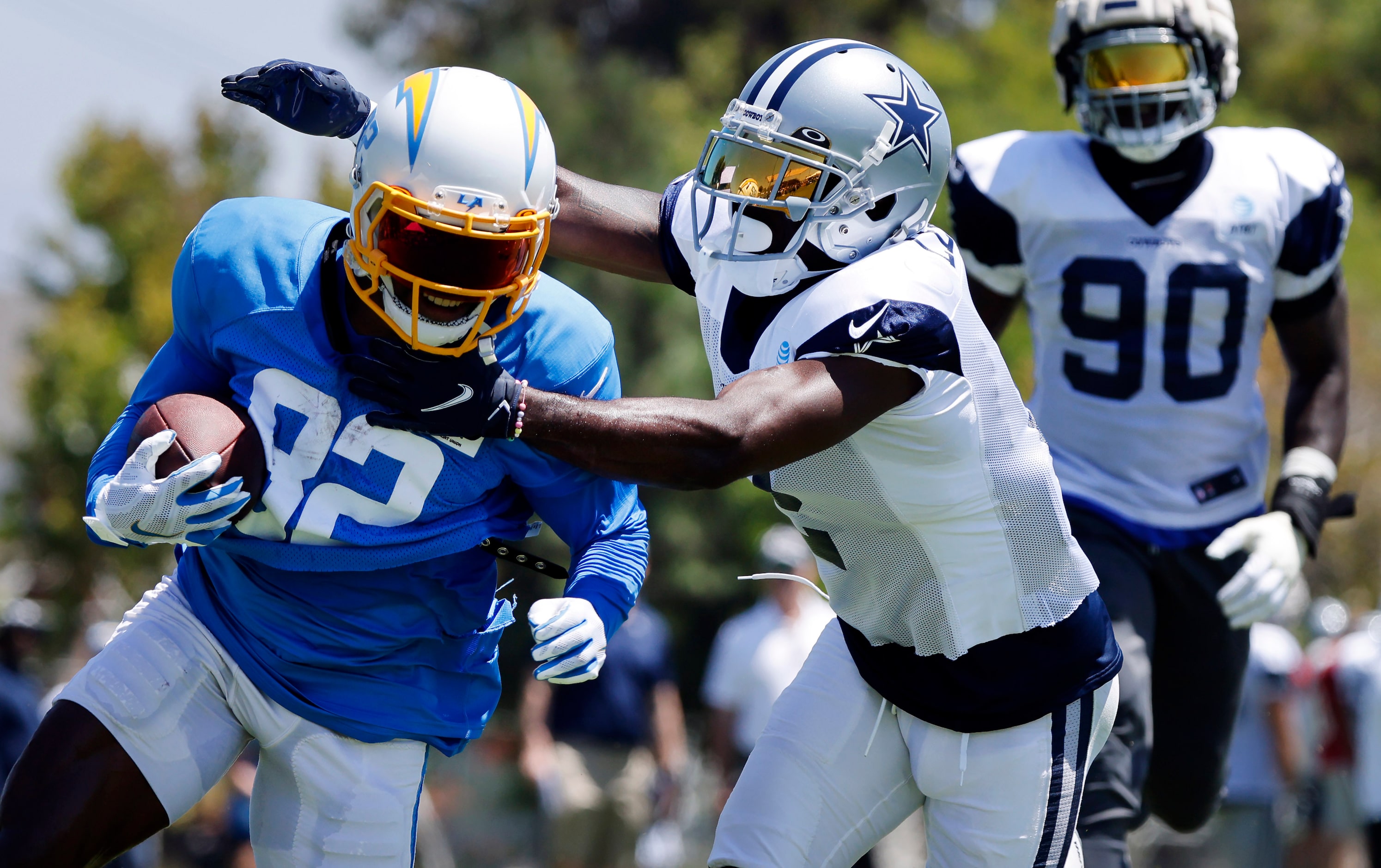 Dallas Cowboys cornerback Jourdan Lewis (2) tackles Los Angeles Chargers wide receiver...