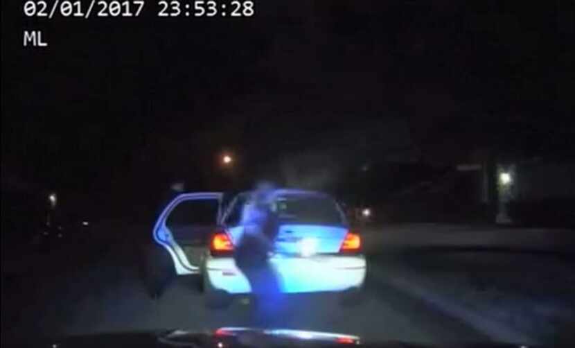 Dash-cam footage showed Arlington police Cpl. Elise Bowden run behind Tavis Crane's car...